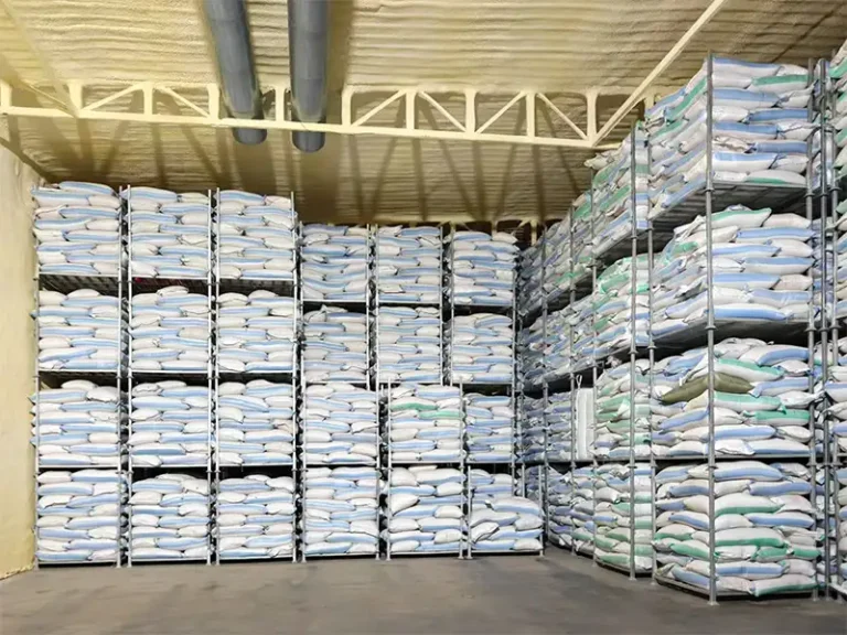 How do stacking racks increase warehouse capacity?